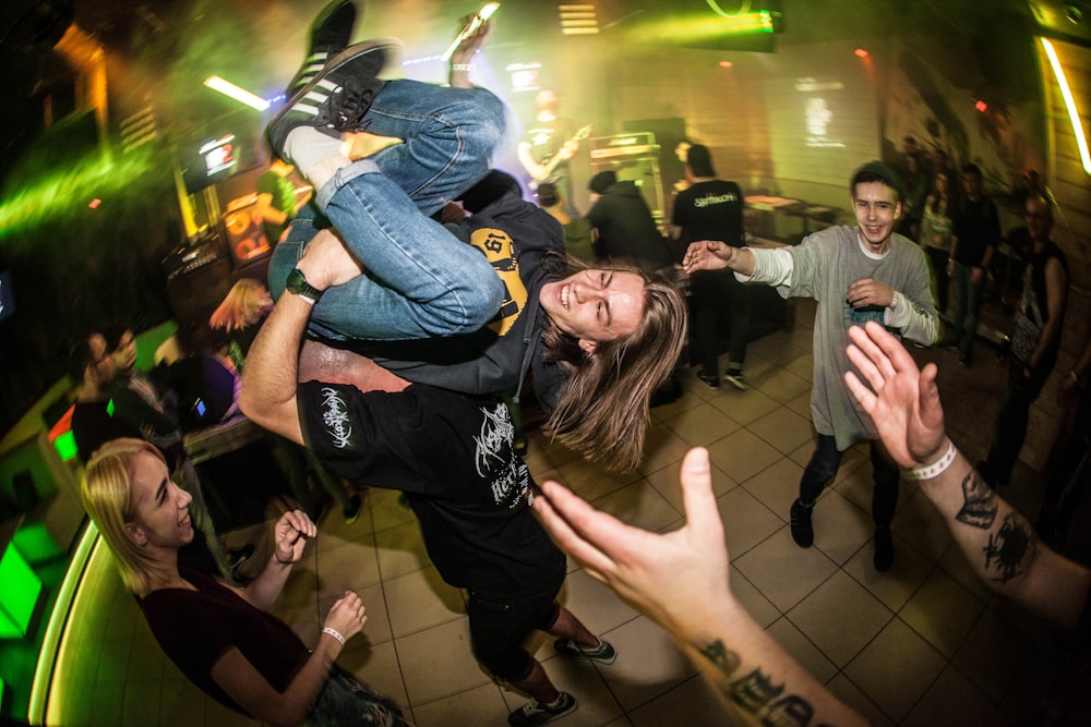 a group of people dancing and having fun