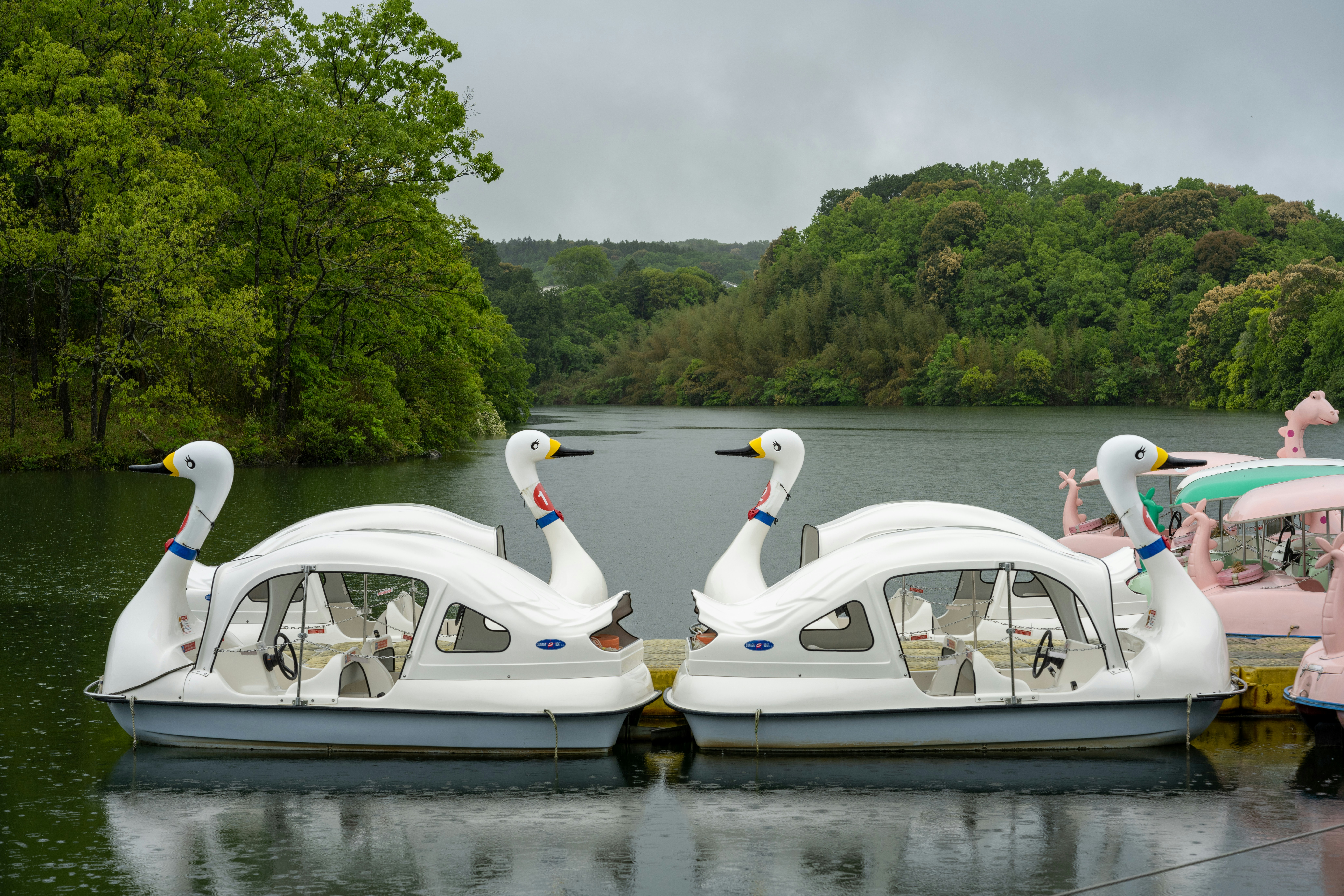 a couple of boats that are sitting in the water