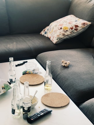 Before-and-after photo of a living room junk removal.