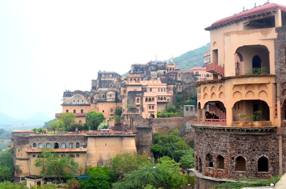 a group of buildings sitting on top of a hill