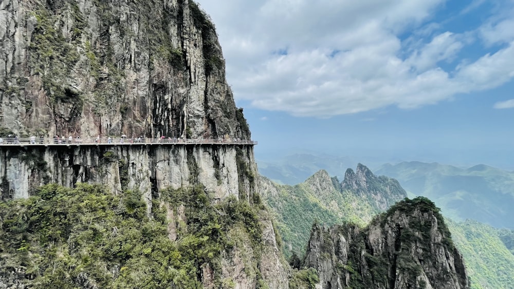 a mountain with a bridge going over it