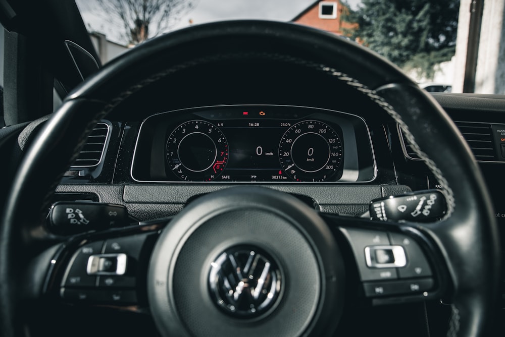 the dashboard of a car with a speedometer