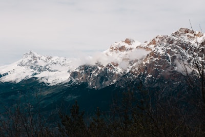 A majestic mountain range covered in snow.