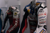 Side view of a Hyper Flow Racing aerodynamic racing suit displayed on a mannequin.