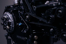 Close-up of intricate mechanical parts and electronic components symbolizing our diverse engineering expertise.