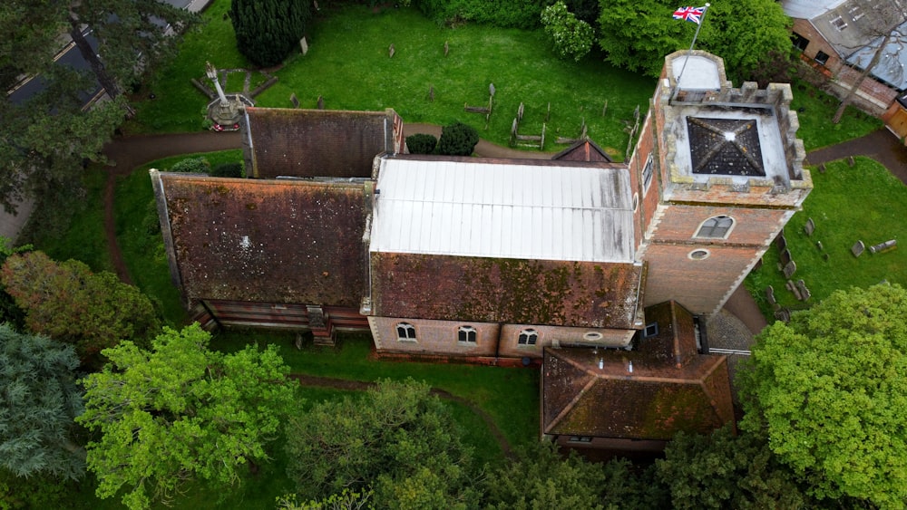 an aerial view of an old building with a star on the roof