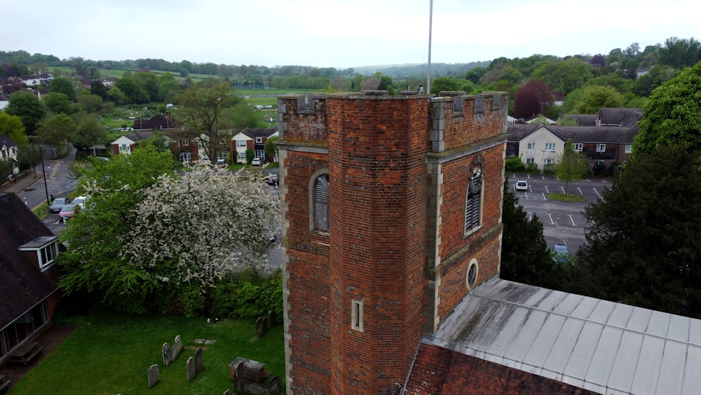 a tall tower with a flag on top of it