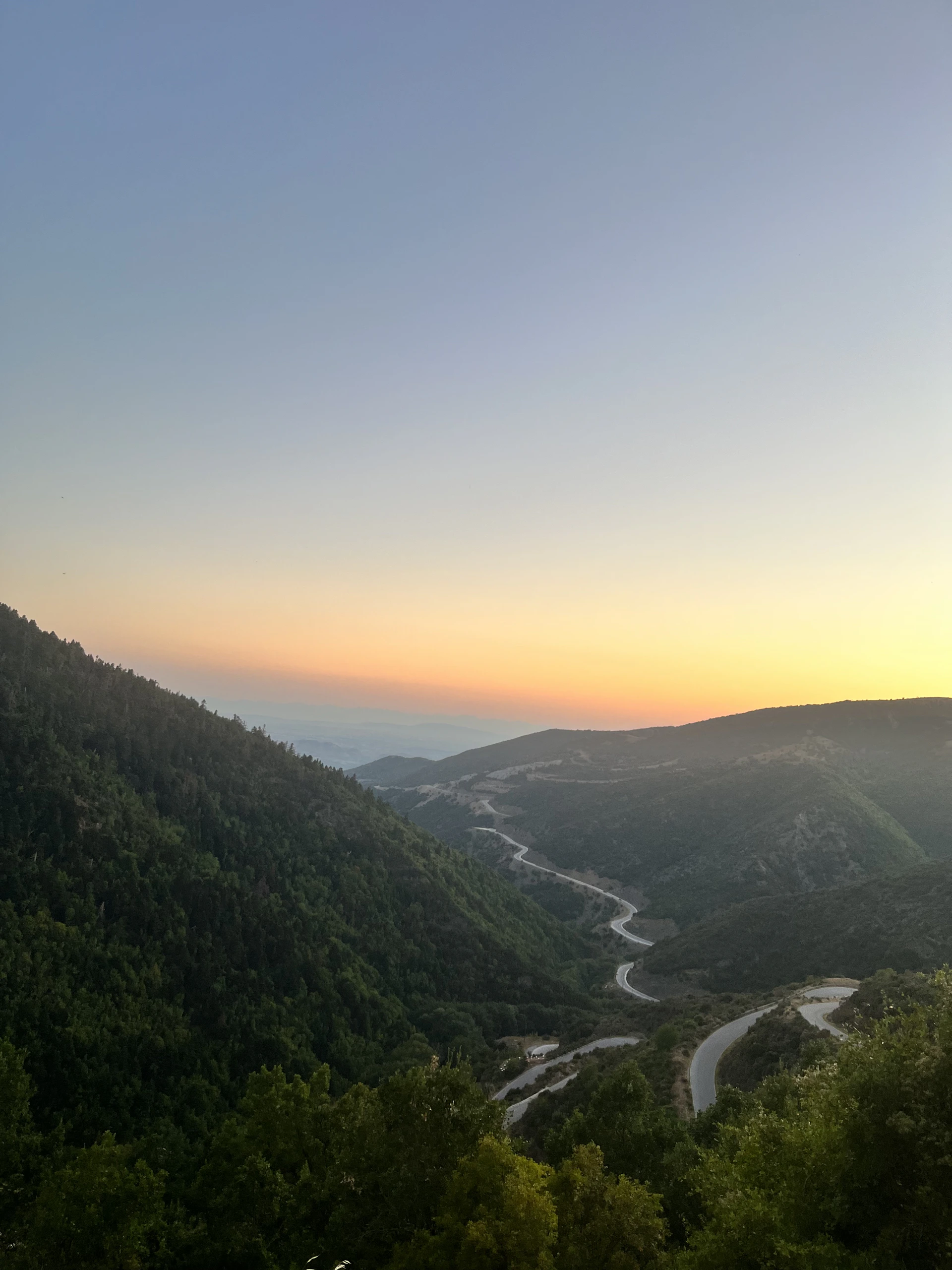 woman wearing yellow long-sleeved dress under white clouds and blue sky during daytime