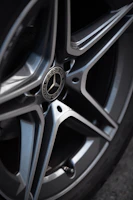 Spotless wheel and rim of a high-end car after a thorough wheel well and rim cleaning.