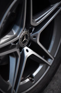 Wheel and tire close-up after thorough cleaning and sealant application, highlighting the metallic finish