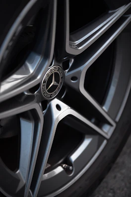 Close-up of the same wheels and tires perfectly cleaned and polished after service.