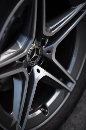 Spotless wheel and rim of a high-end car after a thorough wheel well and rim cleaning.
