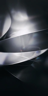 Prototype model of a futuristic gadget showcasing smooth curves and precise layering