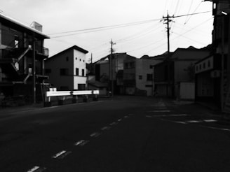 View of a quiet street lined with empty lots ready for building.