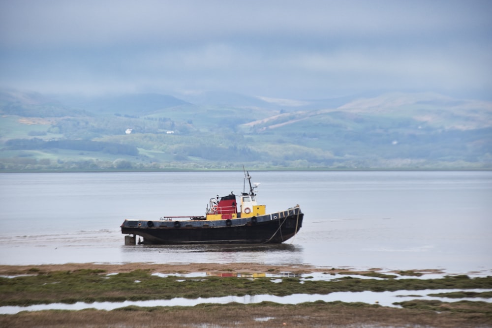 a large boat floating on top of a large body of water