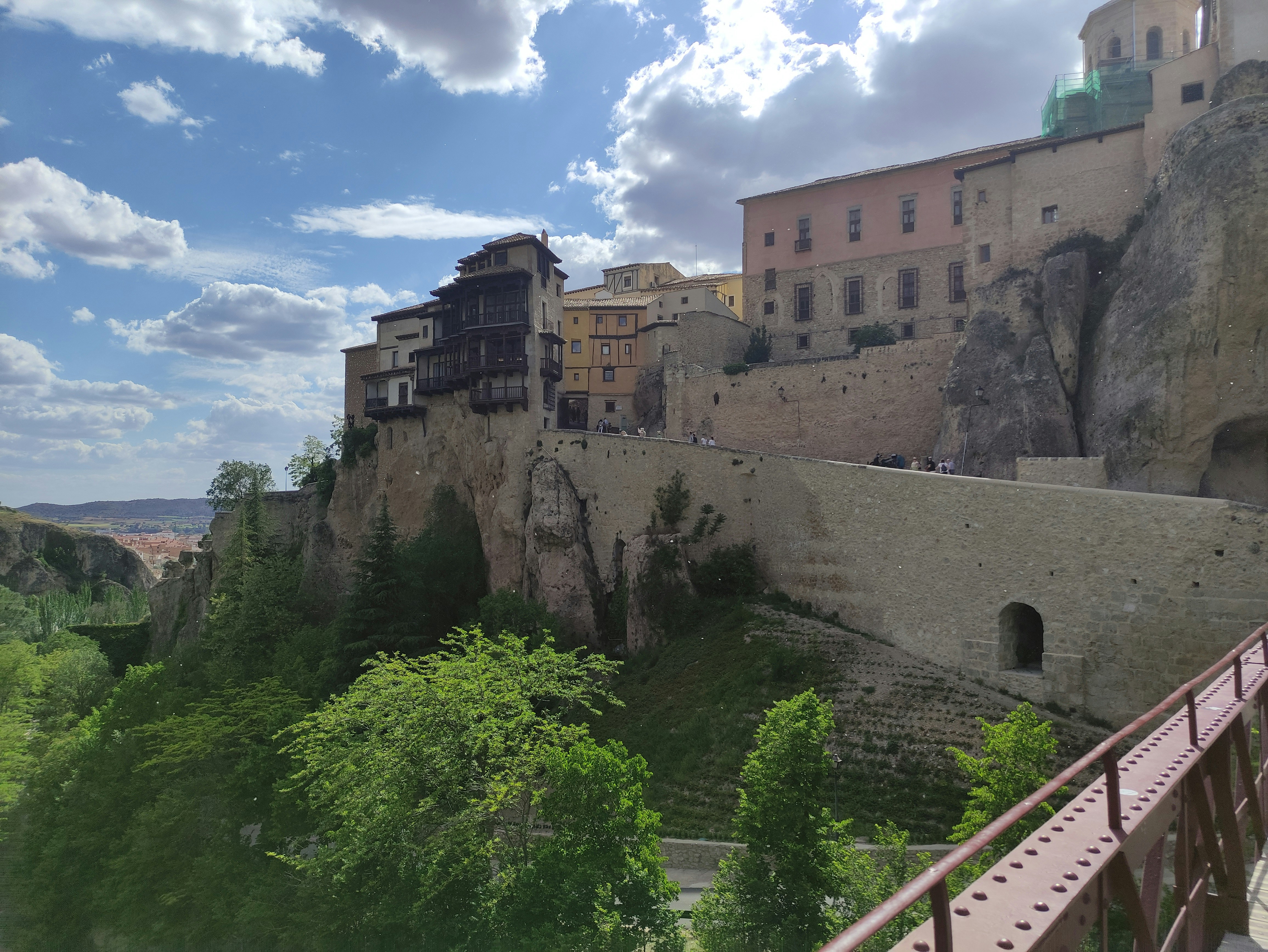 a view of a city from a bridge