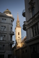 a tall clock tower towering over a city