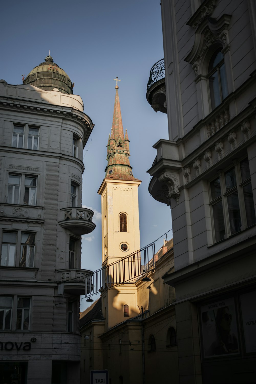 a tall clock tower towering over a city