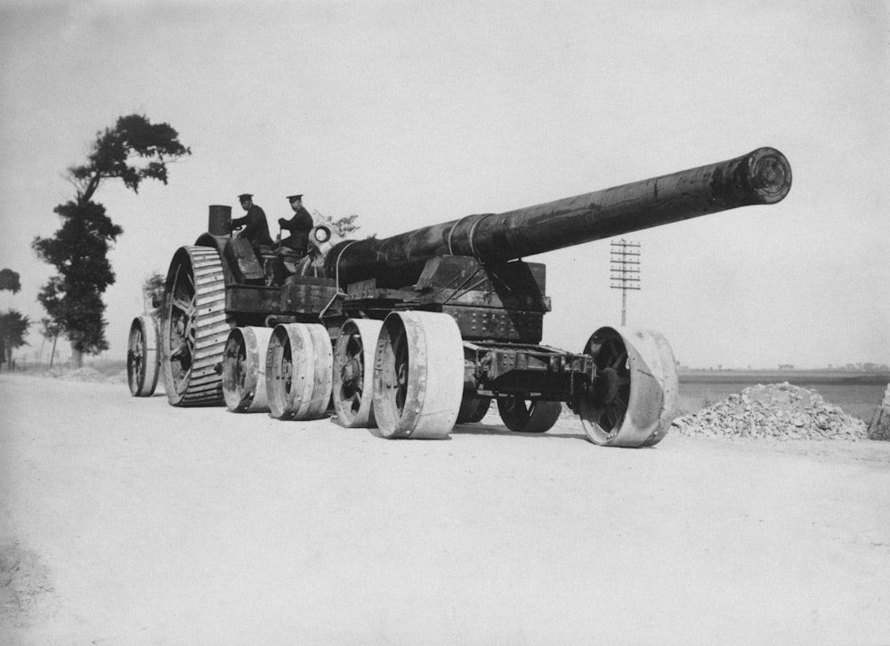 a black and white photo of a cannon