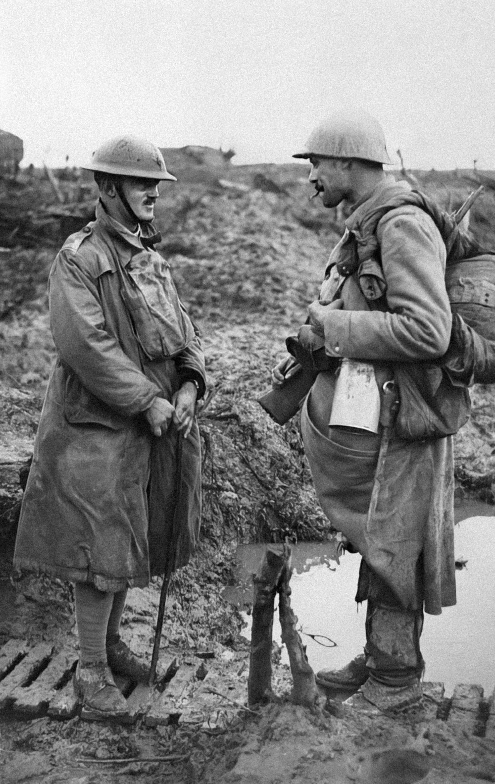 a couple of men standing next to each other