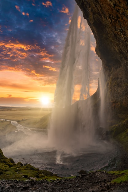 Seljalandsfoss sunset behind falls
