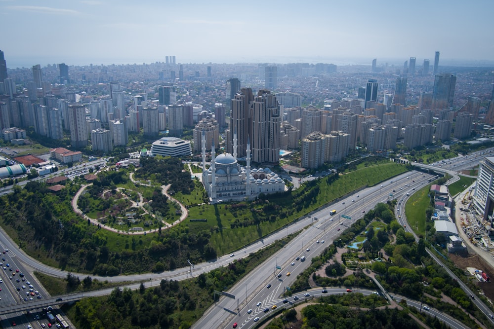 an aerial view of a city with tall buildings