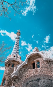 a tall tower with a clock on top of it