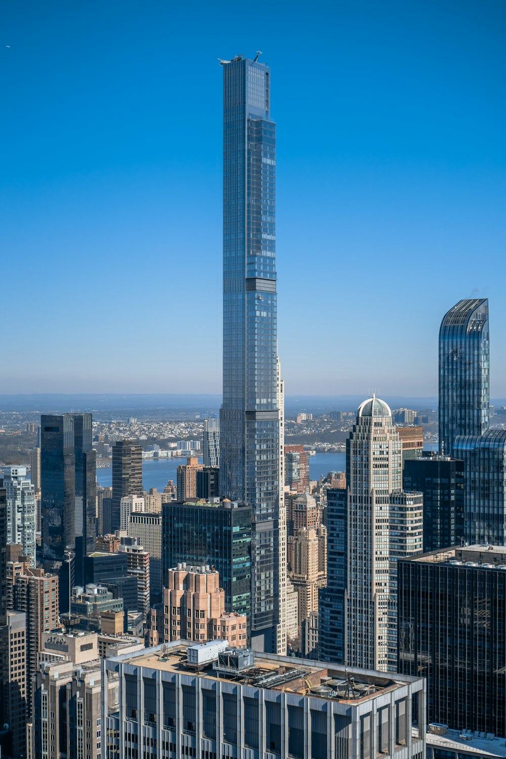 a view of a very tall building in a big city