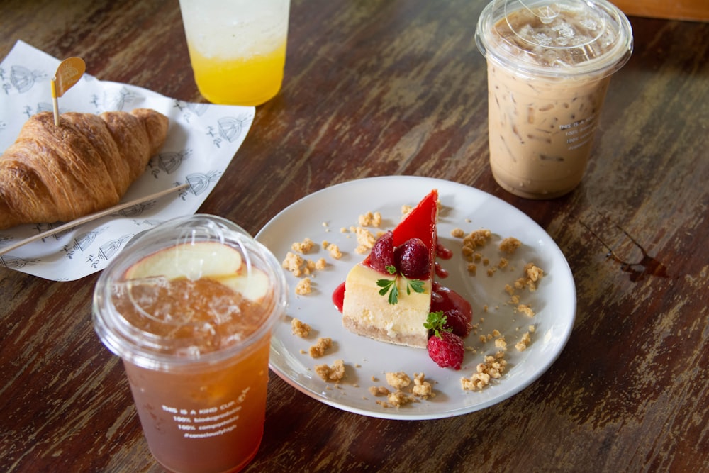 a plate of food and a drink on a table