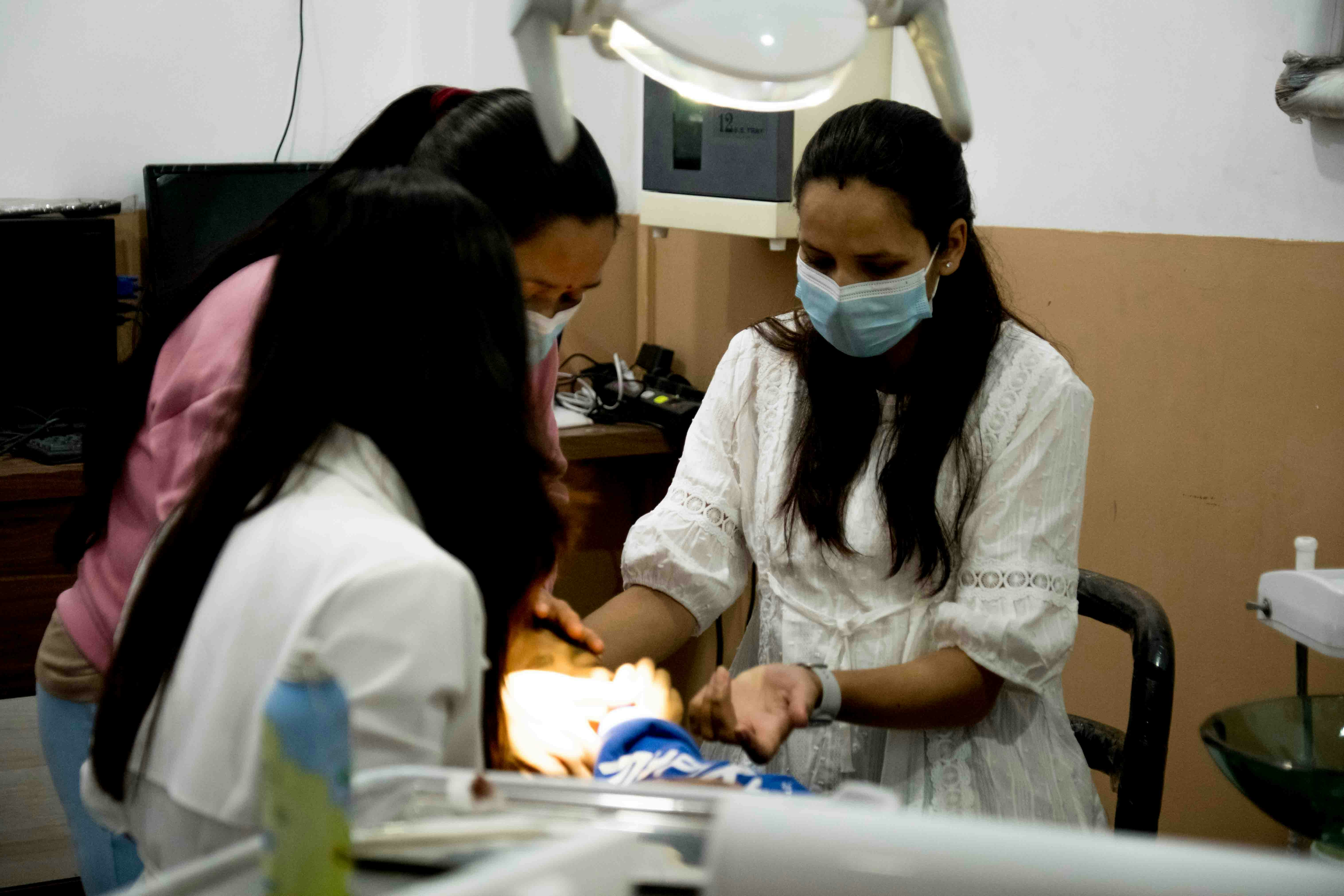 Dentist with patient