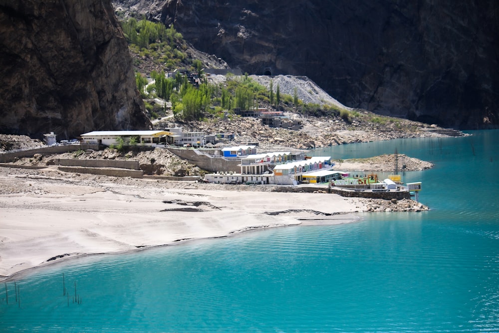 a body of water with a mountain in the background