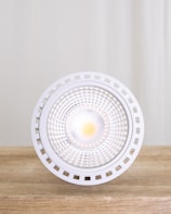 A close-up view of a modern GU10 lamp showcasing its design.