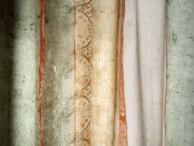 Close-up of NG Decor fabric textures used in curtains and awnings.