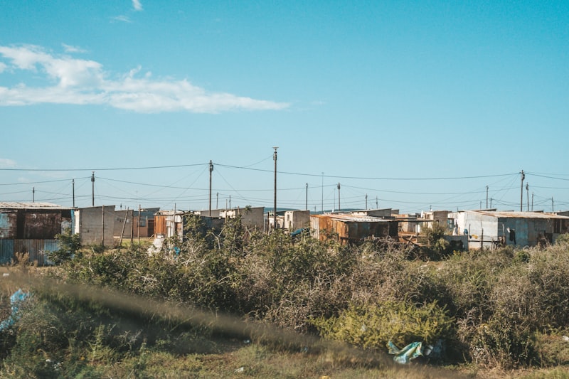 Informal settlement houses on the Cape Flats with power lines overhead
