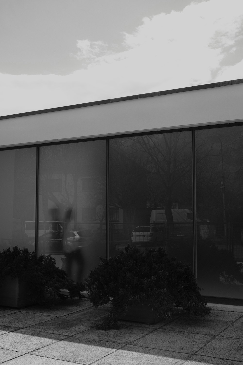 a black and white photo of a store front