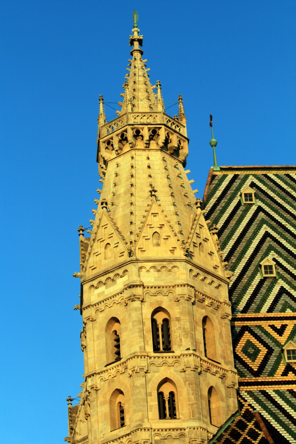 a very tall building with a clock on it's side