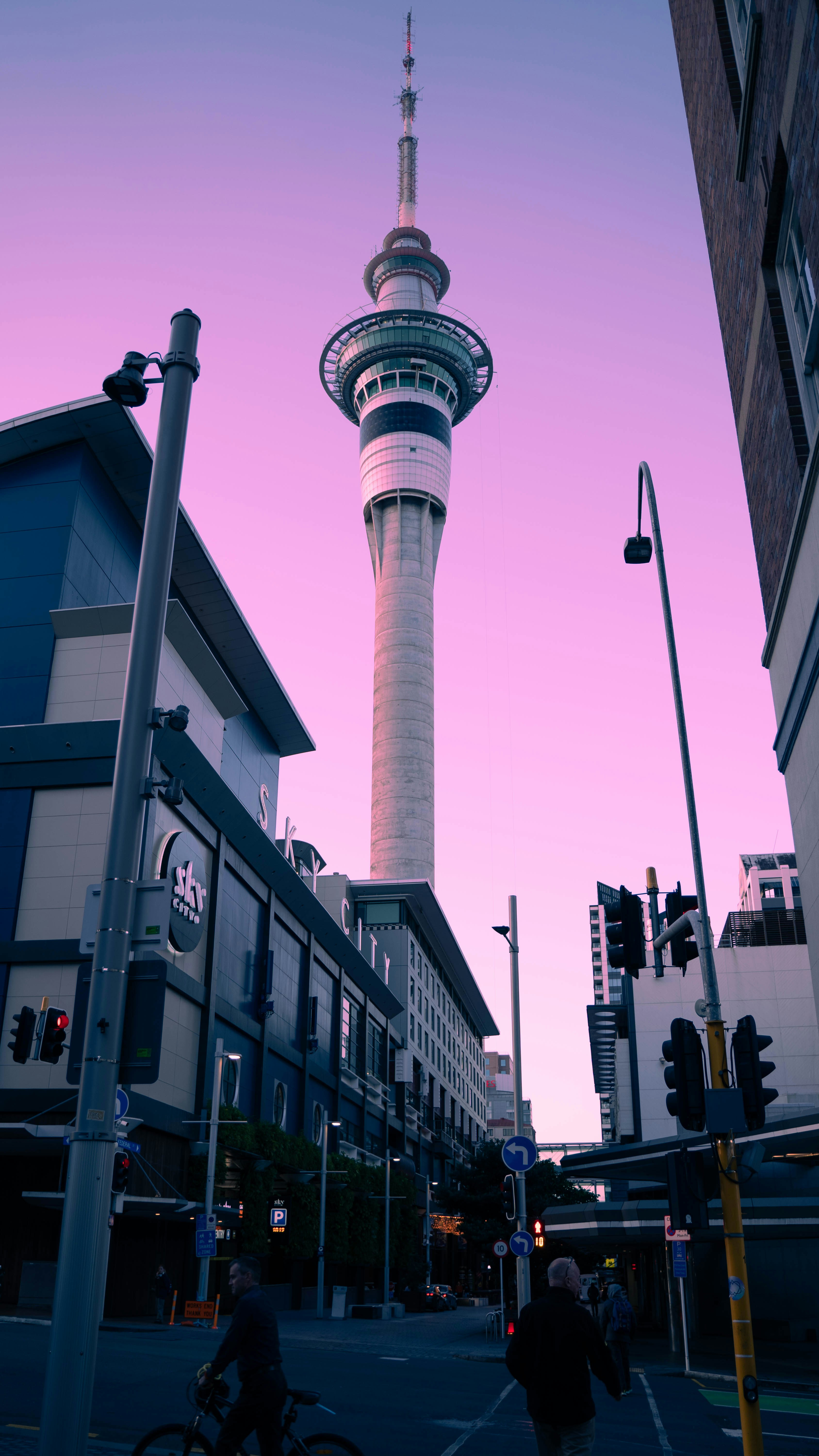 a very tall tower towering over a city