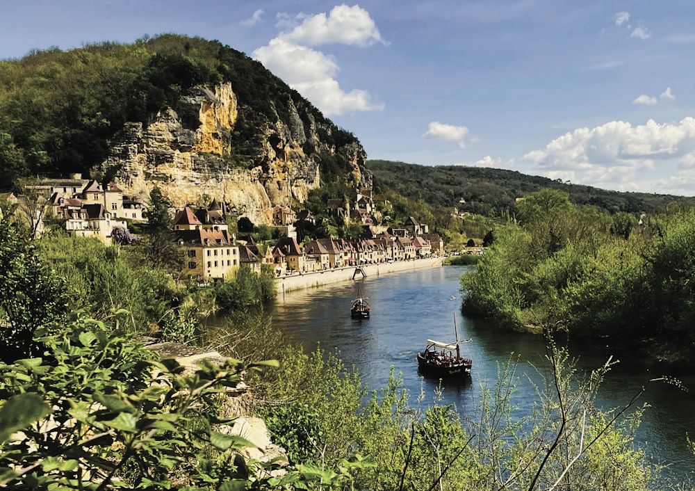 a river that has some boats in it