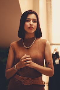 a woman with a tattoo on her arm