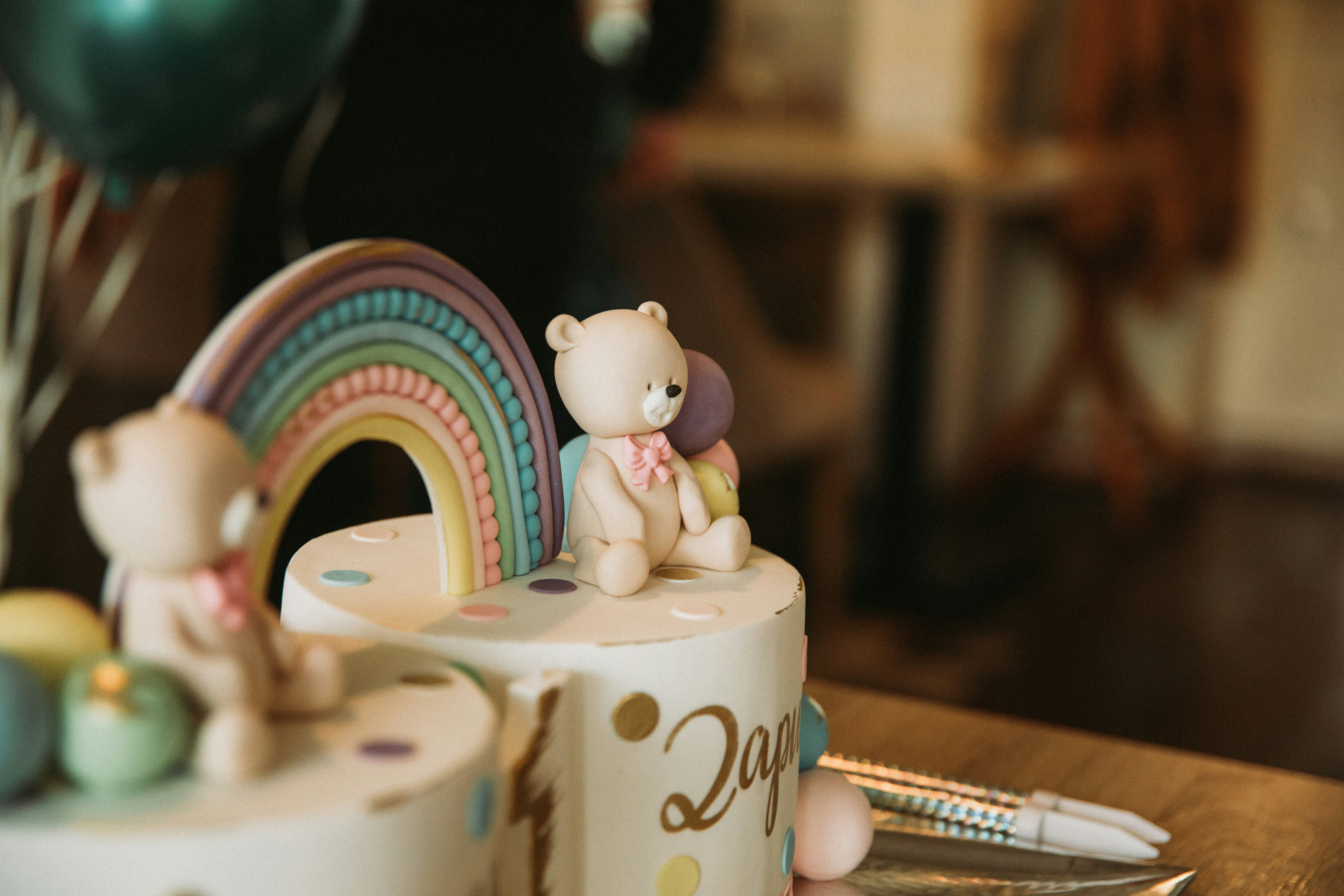 a cake with a bear on top of it