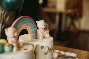 a cake with a bear on top of it