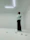 Photo of a thoughtful male psychologist reviewing notes in a bright, minimalistic workspace