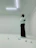 Photo of a thoughtful male psychologist reviewing notes in a bright, minimalistic workspace