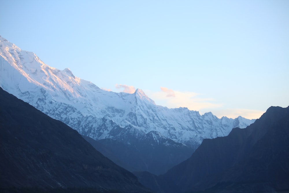 a view of a snow covered mountain range