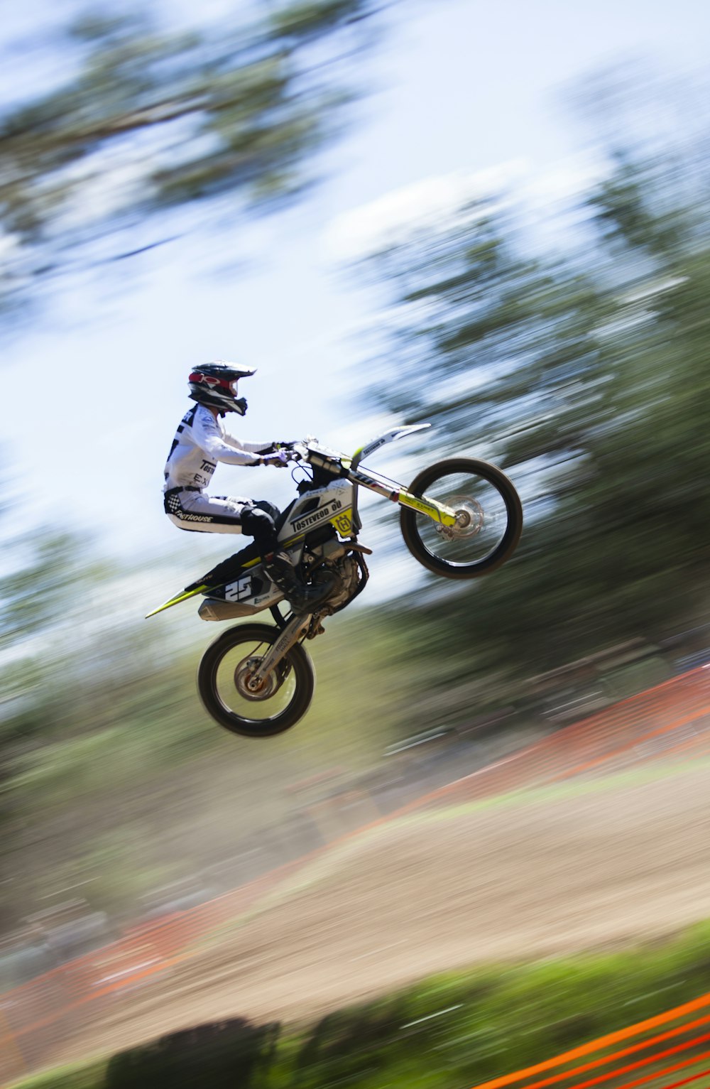 a person on a dirt bike in the air