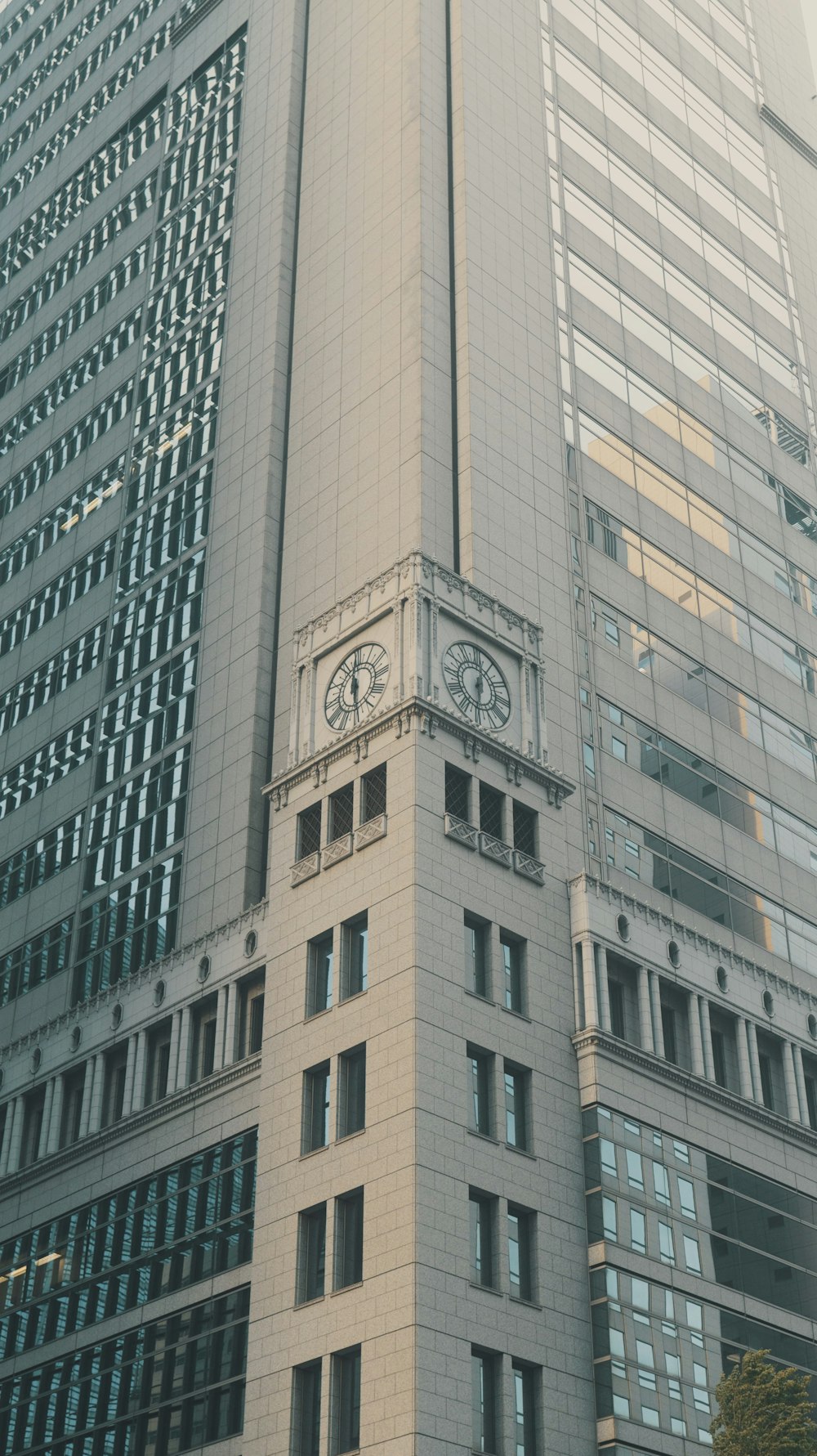 a tall building with a clock on the front of it