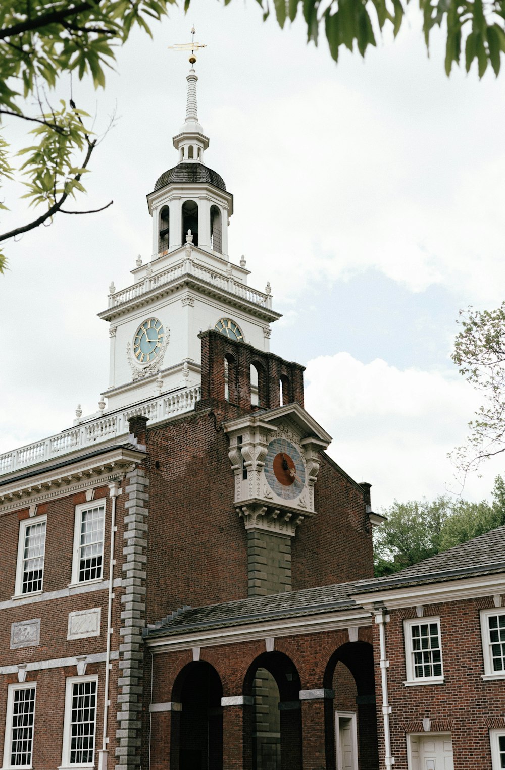 a large brick building with a clock tower