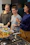 A group of women sharing laughter during a healthy cooking class.