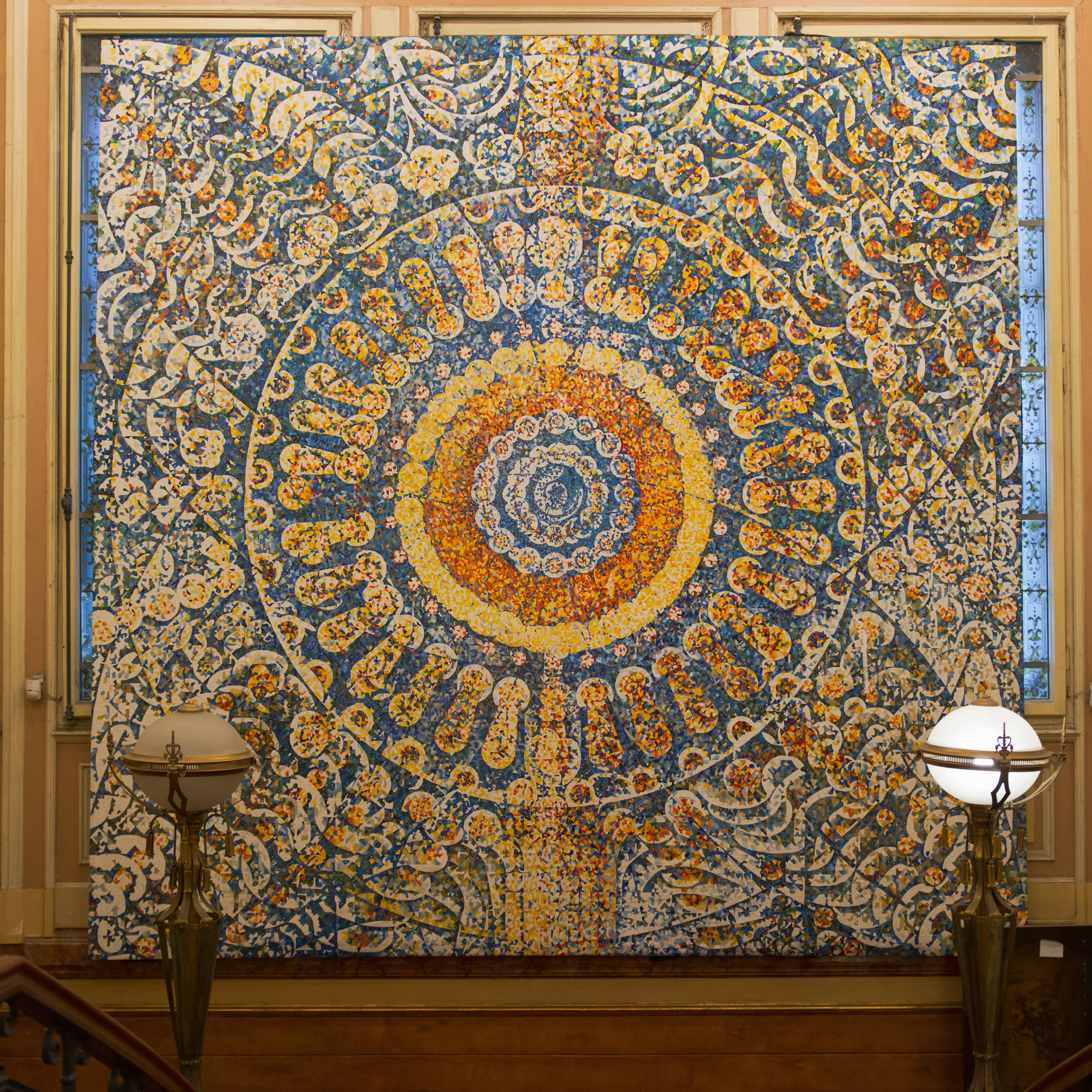 a large painting on the wall of a building