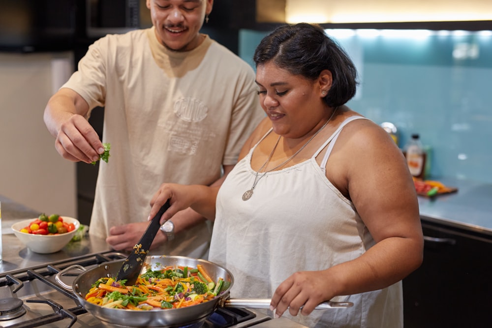 people preparing food in a kitchen